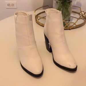 White booties with black heels
